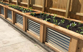 ProWood pressure-treated wood garden bed with metal sides