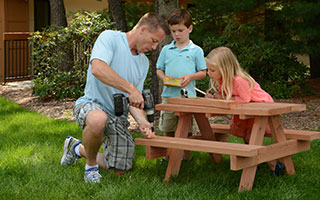 ProWood Color- Treated Picnic Table with Dad and Kids