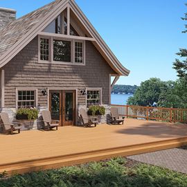 ProWood Pressure-Treated Wood Deck in Cedar Tone Attached to Cottage